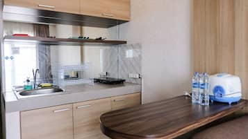Apartment, 2 Bedrooms | Private kitchen | Full-sized fridge, stovetop
