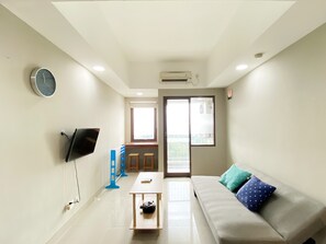 Departamento, 1 habitación | Área de sala de estar