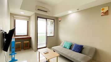 Apartamento, 1 quarto | Área de estar