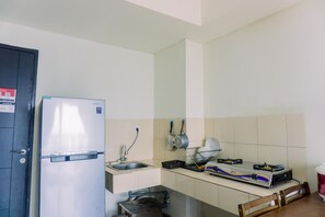 Appartement, 1 chambre | Cuisine privée | Réfrigérateur grande capacité avec congélateur, surface de cuisson