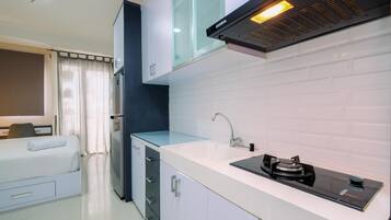 Apartment | Private kitchen | Full-size fridge, stovetop