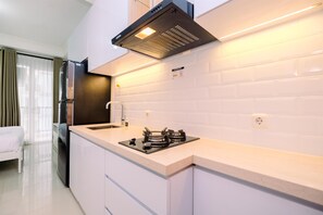 Apartment | Private kitchen | Full-size fridge, stovetop - Minimalist And Best Deal Studio Room At Signature Park Grande Apartment (Jakarta)