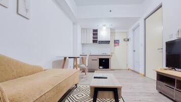 Apartamento, 2 quartos | Área de estar
