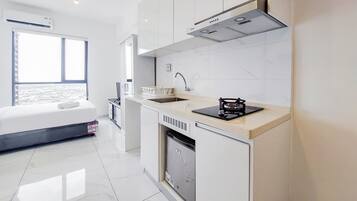 Apartment | Private kitchen | Full-size fridge, stovetop