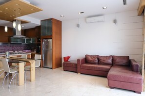 Apartment, 3 Bedrooms | Living area