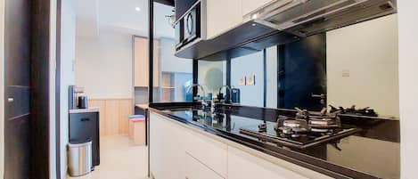 Apartment, 1 Bedroom | Private kitchen | Full-size fridge, stovetop