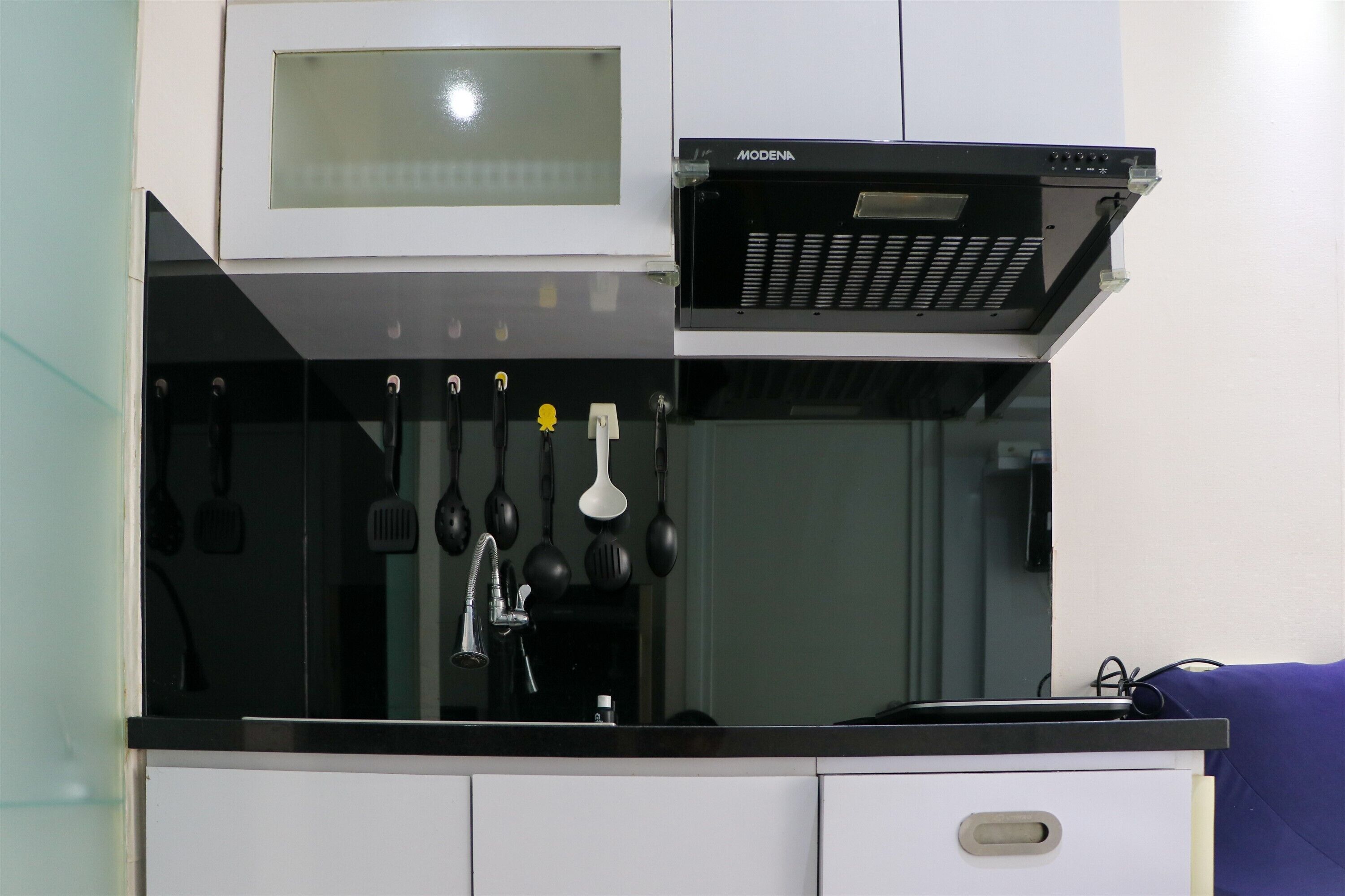 Apartamento, 2 quartos | Cozinha privada | Geladeira grande, cooktop