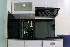 Apartment, 2 Bedrooms | Private kitchen | Full-size fridge, stovetop - Modern 2Br Green Pramuka City Apartment Near Shopping Center (Jakarta)