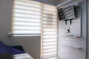 Apartment, 2 Bedrooms | Living area | Flat-screen TV - Modern 2Br Green Pramuka City Apartment Near Shopping Center (Jakarta)