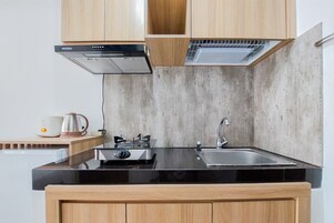 Apartment | Private kitchen | Full-size fridge, stovetop