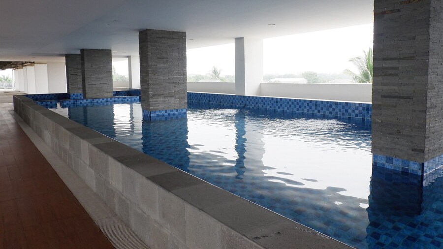 Homey And Cozy Living Studio Poris 88 Apartment