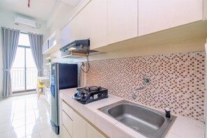 Apartment | Private kitchen | Full-size fridge, stovetop