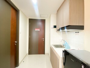 Departamento | Cocina privada | Refrigerador con congelador y parrilla de estufa 