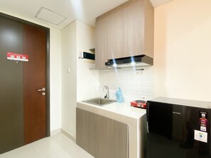 Appartement | Cuisine privée | Réfrigérateur grande capacité avec congélateur, surface de cuisson