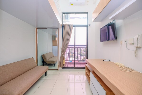 Apartment | Living area - Cozy Stay Studio At Dave Apartment (Depok)