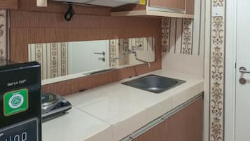 Departamento | Cocina privada | Refrigerador con congelador y parrilla de estufa