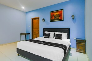 Deluxe Double Room | Bed sheets - Hotel O Istana Griya 2 Hotel (Surakarta)
