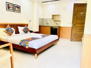 Premium bedding, minibar, desk, laptop workspace