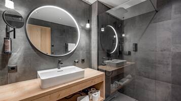Superior Apartment | Bathroom | Shower, rainfall showerhead, hair dryer, bathrobes