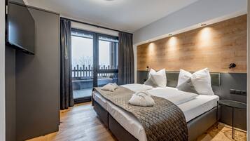 Deluxe-Apartment | Zimmersafe, Verdunkelungsvorhänge, schallisolierte Zimmer