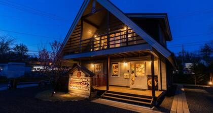 Uta A log house designed in the image of a teddy b / Kitasaku-gun Nagano