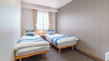 1 室のベッドルーム、デスク、WiFi (無料)、ベッドシーツ