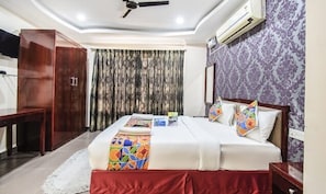 Egyptian cotton sheets, premium bedding, in-room safe, desk - FabHotel Oriental Suites III (Bengaluru)