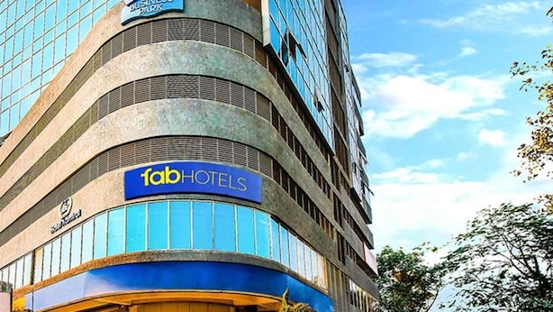 A multi-story building with a sign for 'Fab Hotels.' - Fabhotel Admiral (Mumbai)