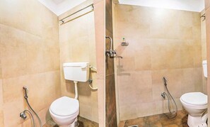 Habitació Deluxe | Bany | Dutxa, capçal de dutxa tipus cascada i articles de tocador gratuïts 