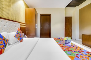 Habitación Deluxe | Sábanas de algodón egipcio y ropa de cama de alta calidad 
