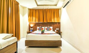 Habitación Deluxe | Sábanas de algodón egipcio, ropa de cama de alta calidad, caja fuerte