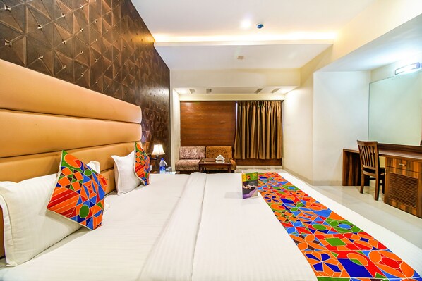 Egyptian cotton sheets, premium bedding, in-room safe, desk - FabHotel Prime President (Bhopal)
