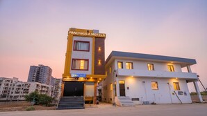 A modern building with a sign for 'Panjkulam Hotels'. - Fabescape Panchkula Motels (Dera Bassi)