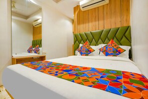Deluxe kamer | Lakens van Egyptisch katoen, luxe beddengoed, een kluis op de kamer