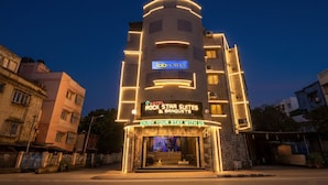 A hotel with a modern facade, featuring a prominent sign for 'Tab Hotels' and 'Rock Star Suites & Banquets'. - Fabhotel Prime Rockstar Suites (Kolkata)