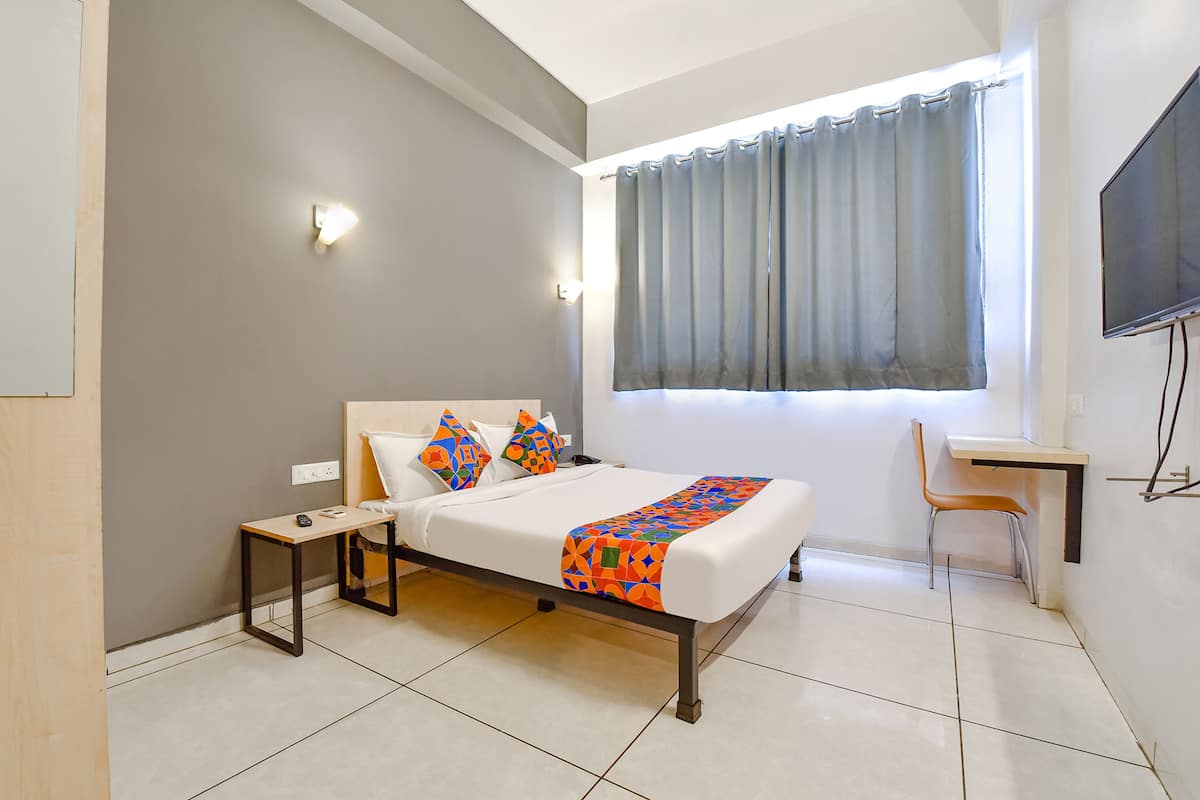 Deluxe kamer | Lakens van Egyptisch katoen, luxe beddengoed, een kluis op de kamer
