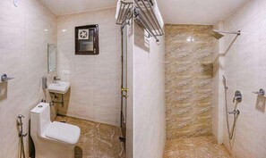 Deluxe Room | Bathroom | Shower, rainfall showerhead, free toiletries, towels - FabHotel Taj Home Stay (New Delhi)