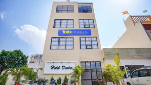 A hotel building with a sign reading "fabHOTELS" and "Hotel Desire". - Fabhotel Desire (Indore)