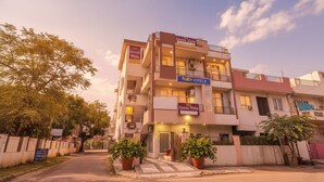A multi-story hotel with balconies, a sign for 'fabHOTELS', and a 'Green Vista' entrance. - FabHotel Green Vista Malviya Nagar (Jaipur)