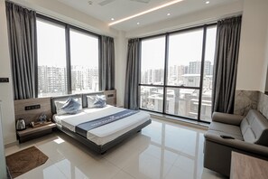 Quarto superluxo, vista para a cidade | 1 quarto, Wi-Fi de cortesia, roupa de cama