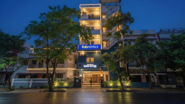 A multi-story building with a sign for 'fabHOTELS' and 'Kings Suites'. - FabHotel Kings Suites Banaswadi (Bengaluru)