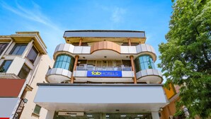 A hotel with a modern facade, a prominent sign reading "Fab Hotels," and a welcoming entrance. - FabHotel Veetara (New Delhi)