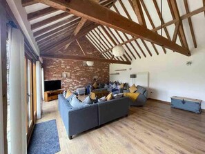 House, Multiple Beds | Living area | Flat-screen TV