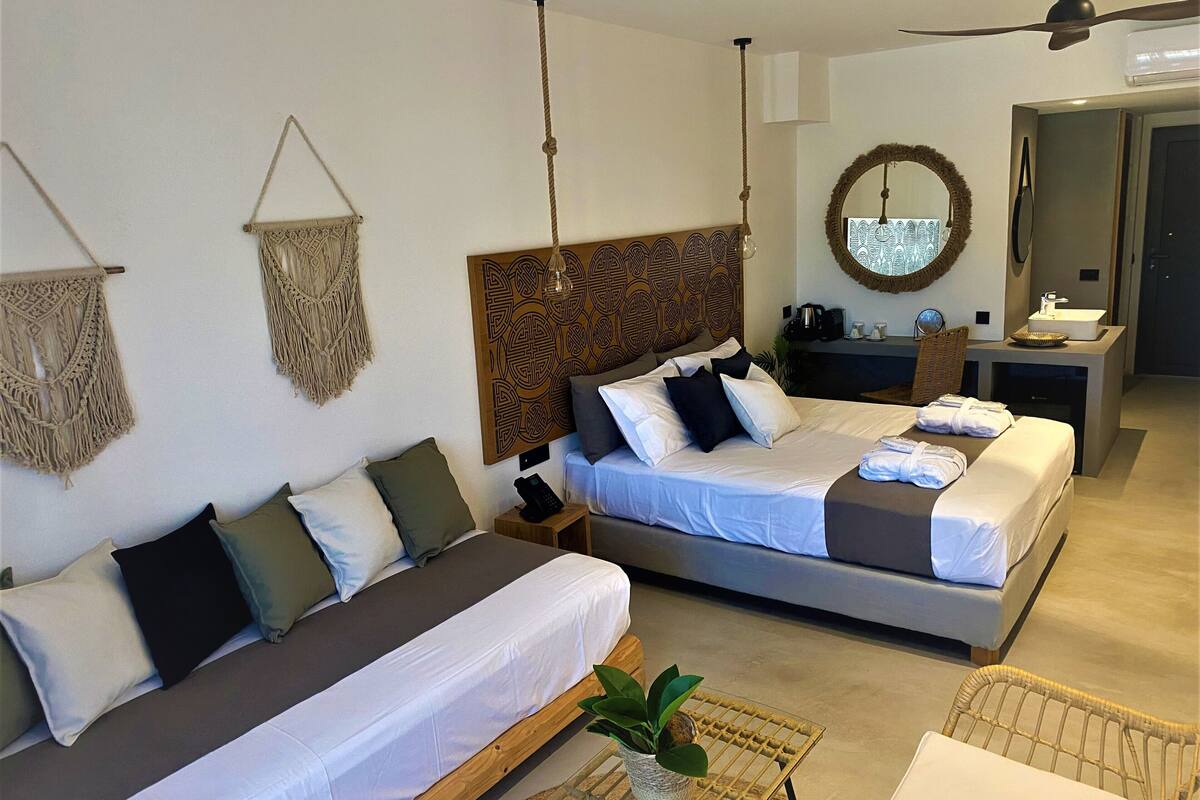 Kamar Triple Superior, pemandangan kebun | 1 kamar tidur, minibar, kedap suara, dan Wi-Fi gratis