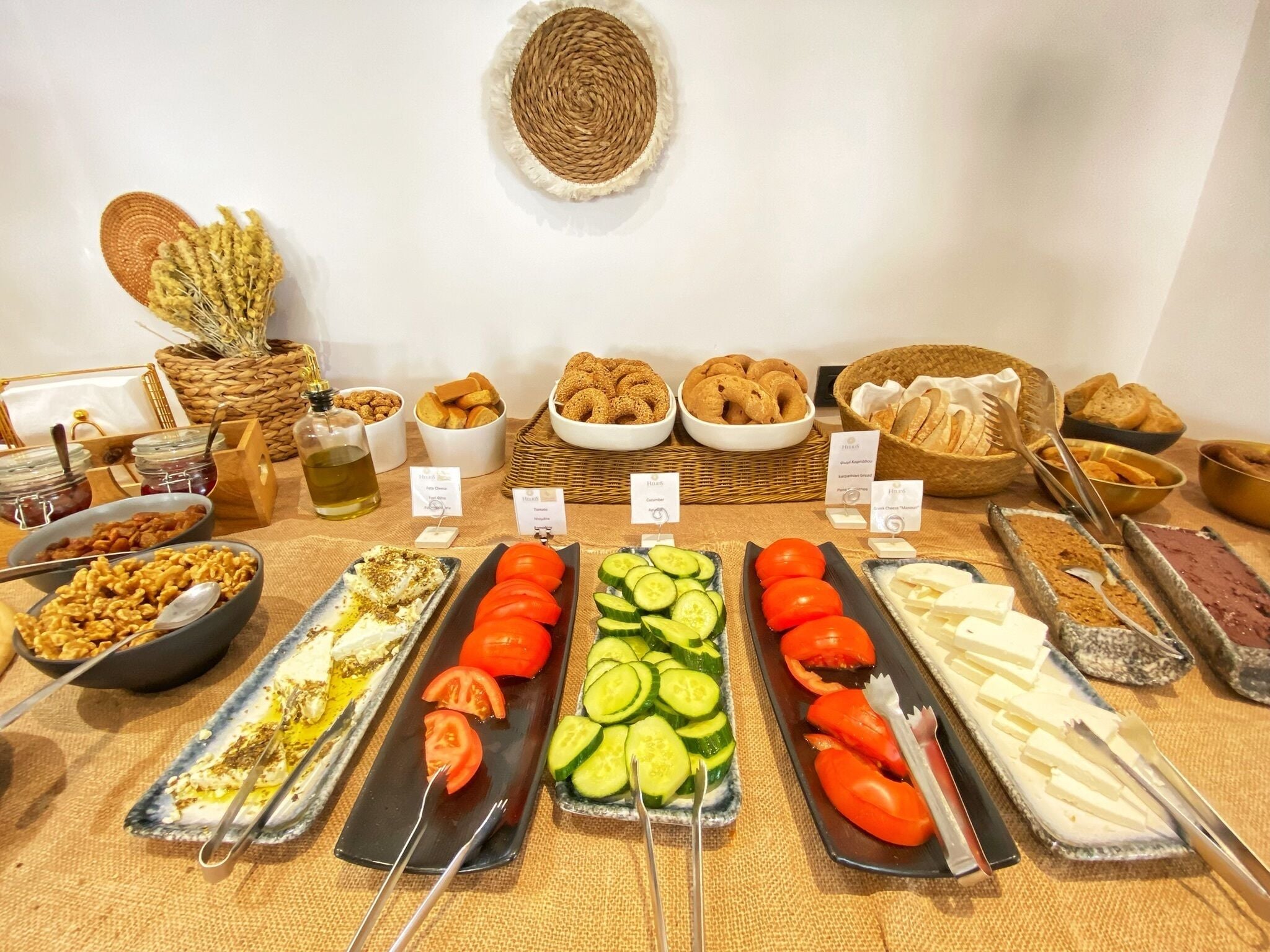 A buffet with various food items and condiments.