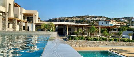 Outdoor pool, pool umbrellas, pool loungers