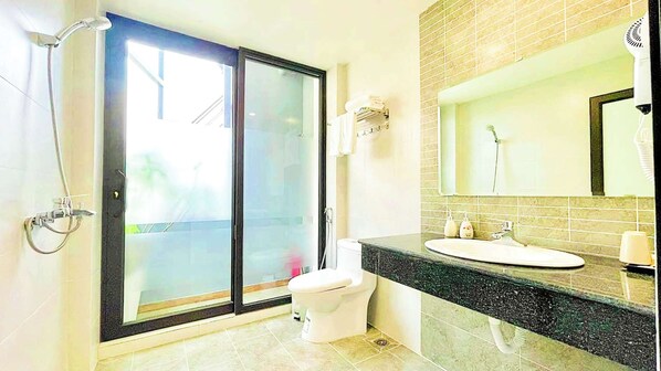 Family Room, 2 Bedrooms, Balcony, City View | Bathroom | Shower, rainfall showerhead, designer toiletries, hair dryer - BAI CHAY PANDA HOTEL (Ha Long)