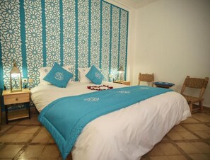 Kamar Triple Comfort | Brankas dan didekorasi berbeda-beda