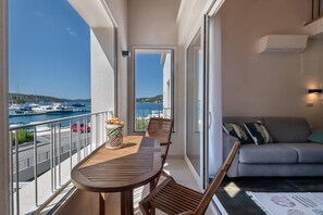 Apartment, Mehrere Betten | Balkon