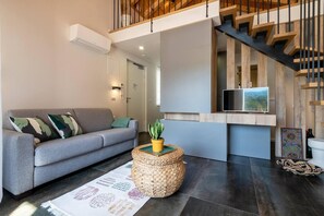 Apartment, Mehrere Betten | Wohnbereich